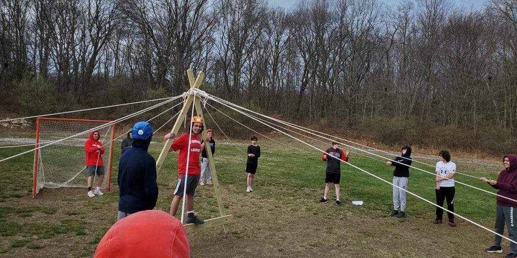 Youth Participating in A Frame Portable Adventure Element Adventure Facilitation Foundations