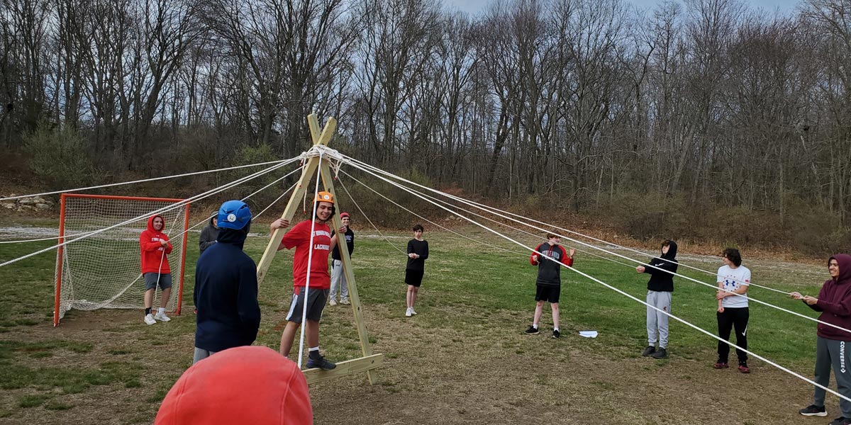 Youth Participating in A Frame Portable Adventure Element Adventure Facilitation Foundations