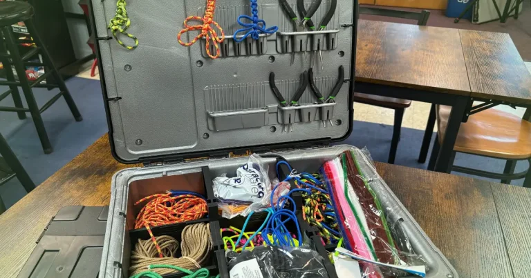A Paracord Crafting Experience Wednesday workshop with paracord making materials on a table inside a kit box