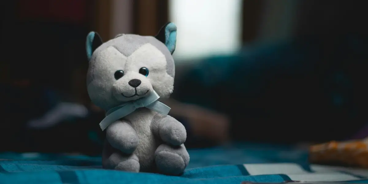 Cozy Critter Plushies Steam Futures Workshop Series Dog homemade plushie sitting on a table